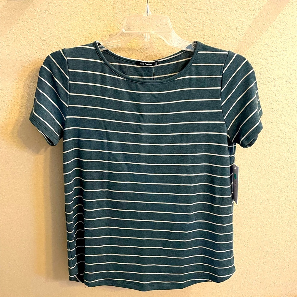 Never worn Pink Clover lite wgt short sleeve top.